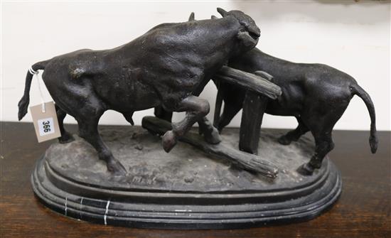 After Mene. A bronze bull group